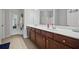 Spacious bathroom featuring a double vanity with ample counter space and stylish cabinets at 3203 Cyrus Point Nw Ln, Kennesaw, GA 30152