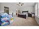Bedroom with neutral carpet, ceiling fan, and abundant natural light at 3203 Cyrus Point Nw Ln, Kennesaw, GA 30152