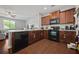 Well-equipped kitchen with stainless steel appliances and hardwood floors at 3203 Cyrus Point Nw Ln, Kennesaw, GA 30152