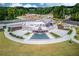 Aerial view of green space featuring an amphitheater, water feature and walking paths at 4236 Tacoma Trce, Suwanee, GA 30024