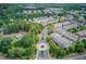 An aerial view showcasing the residential neighborhood with lush greenery and well-maintained landscaping at 4236 Tacoma Trce, Suwanee, GA 30024