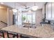 Well-equipped kitchen with stainless steel appliances, granite counters, and ample cabinetry at 4236 Tacoma Trce, Suwanee, GA 30024
