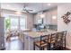 Modern kitchen with granite countertops, stainless steel appliances, and kitchen island at 4236 Tacoma Trce, Suwanee, GA 30024