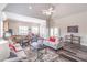 Open floor plan with living room flowing into kitchen and dining area, creating a spacious feel at 4236 Tacoma Trce, Suwanee, GA 30024