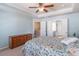 Spacious main bedroom offers ample storage and easy access to the bathroom and hallway at 4236 Tacoma Trce, Suwanee, GA 30024