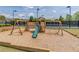 The community playground offers a slide, swings and a jungle gym at 4236 Tacoma Trce, Suwanee, GA 30024