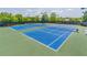 A view of immaculately maintained tennis courts at the community at 4236 Tacoma Trce, Suwanee, GA 30024