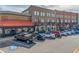 Street view featuring restaurants and retail spaces in the walkable Town Center neighborhood at 4236 Tacoma Trce, Suwanee, GA 30024