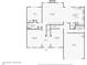 Detailed first-floor plan showcasing the layout with a living room, kitchen, garage, and more at 6565 Bentley Ridge Dr, Cumming, GA 30040