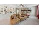 Comfortable living room featuring built-in shelving, neutral tones, and a cozy sectional sofa at 6565 Bentley Ridge Dr, Cumming, GA 30040