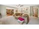 Comfortable living room with large sectional sofa and built-in shelving at 6565 Bentley Ridge Dr, Cumming, GA 30040