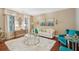 Bright living area features a cozy design with plush seating and elegant decorations at 6565 Bentley Ridge Dr, Cumming, GA 30040