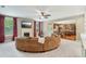 Open concept living room with fireplace and access to kitchen at 6565 Bentley Ridge Dr, Cumming, GA 30040