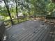 Spacious back deck is perfect for outdoor entertaining, with a wooded view at 981 Dundee Dr, Lilburn, GA 30047