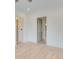 Minimalist bedroom with adjacent doorways and natural light at 1304 Six Sisters St, Dacula, GA 30019