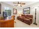 Cozy bedroom featuring a desk, comfortable chair and a lounge with side table at 142 Jaime Dr, Canton, GA 30114