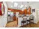 Cozy kitchen with stainless steel appliances, granite countertops, and a breakfast bar at 142 Jaime Dr, Canton, GA 30114