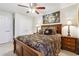 Spacious main bedroom with elegant bed, closet doors, and side tables at 142 Jaime Dr, Canton, GA 30114