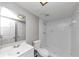 Bathroom features white tiling and a modern sink vanity at 4261 Autumn Hill Dr, Stone Mountain, GA 30083