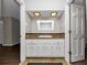 Bathroom vanity area with white cabinets at 4261 Autumn Hill Dr, Stone Mountain, GA 30083