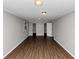 Spacious bedroom featuring hardwood floors and ample closet space at 4261 Autumn Hill Dr, Stone Mountain, GA 30083