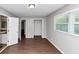 Bright bedroom features hardwood floors, closet, and natural light at 4261 Autumn Hill Dr, Stone Mountain, GA 30083