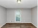 Cozy bedroom with neutral walls and a bright window at 4261 Autumn Hill Dr, Stone Mountain, GA 30083