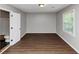This bedroom has hardwood floors and attached bathroom at 4261 Autumn Hill Dr, Stone Mountain, GA 30083