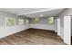 Open bonus room with hardwood floors and plenty of natural light at 4261 Autumn Hill Dr, Stone Mountain, GA 30083