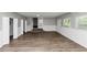 Open bonus room with hardwood floors and access to stairs at 4261 Autumn Hill Dr, Stone Mountain, GA 30083