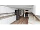 Spacious kitchen features stainless steel appliances and white cabinetry at 4261 Autumn Hill Dr, Stone Mountain, GA 30083