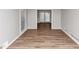 Living room featuring hardwood flooring and white trim at 4261 Autumn Hill Dr, Stone Mountain, GA 30083