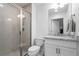 Modern bathroom featuring glass shower, white subway tile, and granite countertop at 64 Emerson Hill Sq, Marietta, GA 30060