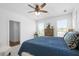 Bright bedroom featuring a large bed and large windows at 64 Emerson Hill Sq, Marietta, GA 30060