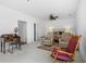 Spacious bedroom with sitting area, ceiling fan, and a rocking chair at 64 Emerson Hill Sq, Marietta, GA 30060