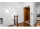 Hallway with a residential elevator with wooden walls, hardwood floors, and views at 64 Emerson Hill Sq, Marietta, GA 30060