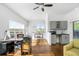 Sunlit living room with hardwood floors, wet bar, and great natural light at 64 Emerson Hill Sq, Marietta, GA 30060