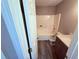 Bathroom featuring a shower, toilet, and vanity, all with modern finishes at 11447 Vinea Ln, Hampton, GA 30228