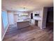 Spacious kitchen with granite counters, an island, and updated appliances at 11447 Vinea Ln, Hampton, GA 30228