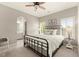 Inviting bedroom with large windows and an ensuite bathroom and walk-in closet at 1286 Whisper Cove Dr, Buford, GA 30518