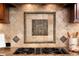 Decorative backsplash tile over the gas range cooktop in a modern luxury kitchen at 1286 Whisper Cove Dr, Buford, GA 30518