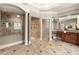 Spacious main bathroom featuring a luxurious shower, vanity, and tub at 1286 Whisper Cove Dr, Buford, GA 30518