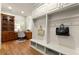Mudroom with plenty of storage, complete with built-in desk and cabinetry at 1286 Whisper Cove Dr, Buford, GA 30518