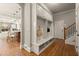 Mudroom boasts built-in storage and convenient access to the kitchen and staircase at 1286 Whisper Cove Dr, Buford, GA 30518