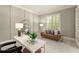 Comfortable home office with a large desk, soft couch, and natural light at 1286 Whisper Cove Dr, Buford, GA 30518