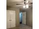 Bedroom featuring neutral walls, carpet, and closet at 159 Parkside Dr, Stockbridge, GA 30281