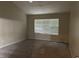 Bedroom with carpet, window, and neutral color palette at 159 Parkside Dr, Stockbridge, GA 30281