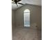 Bedroom with neutral walls, carpet and large window at 159 Parkside Dr, Stockbridge, GA 30281