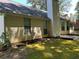 Back view of home with window details and yard at 159 Parkside Dr, Stockbridge, GA 30281