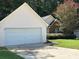 Close up of home featuring an attached two car garage at 159 Parkside Dr, Stockbridge, GA 30281